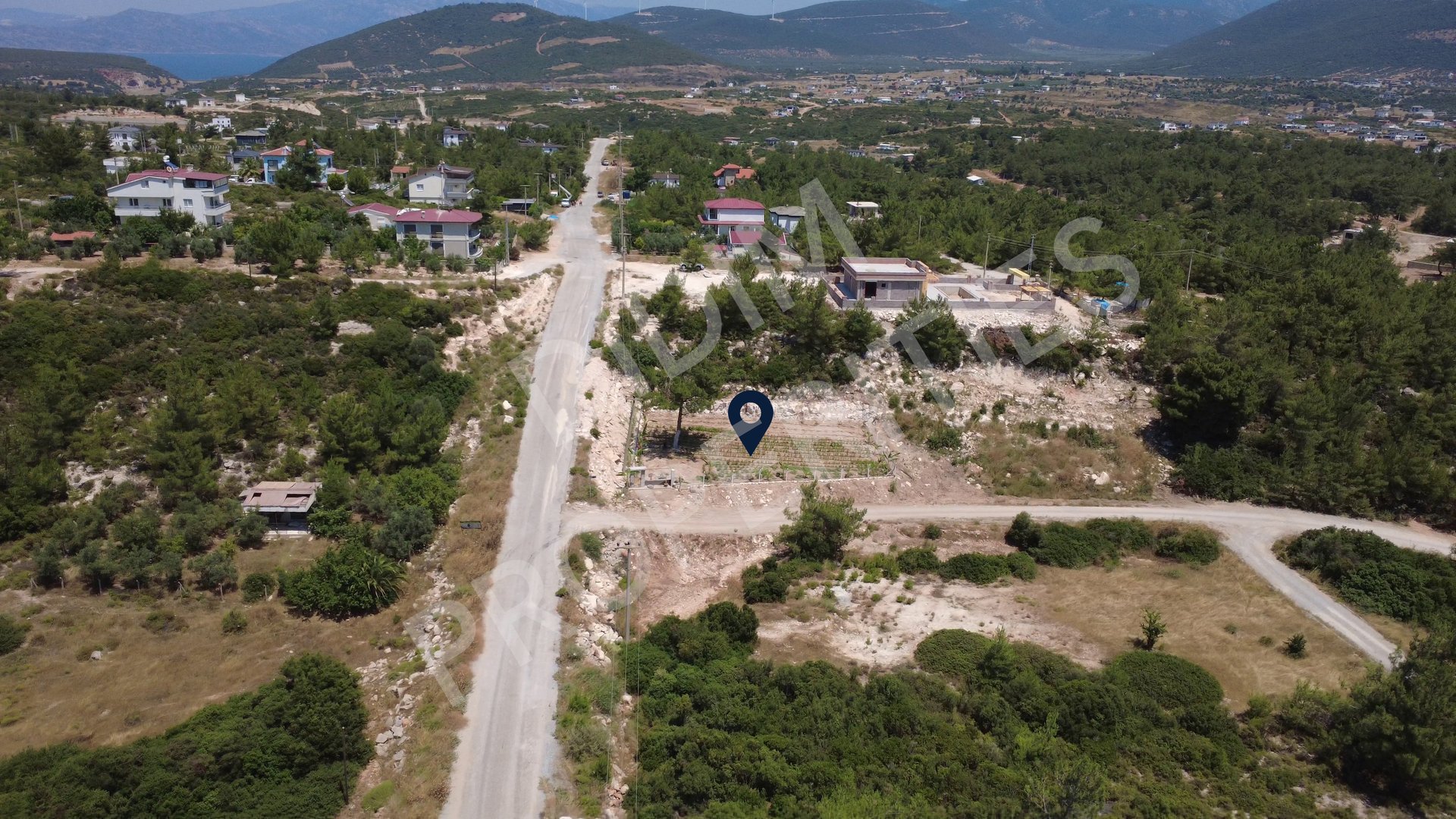Seyrantepe building plot — aerial view of the plot in pine forest